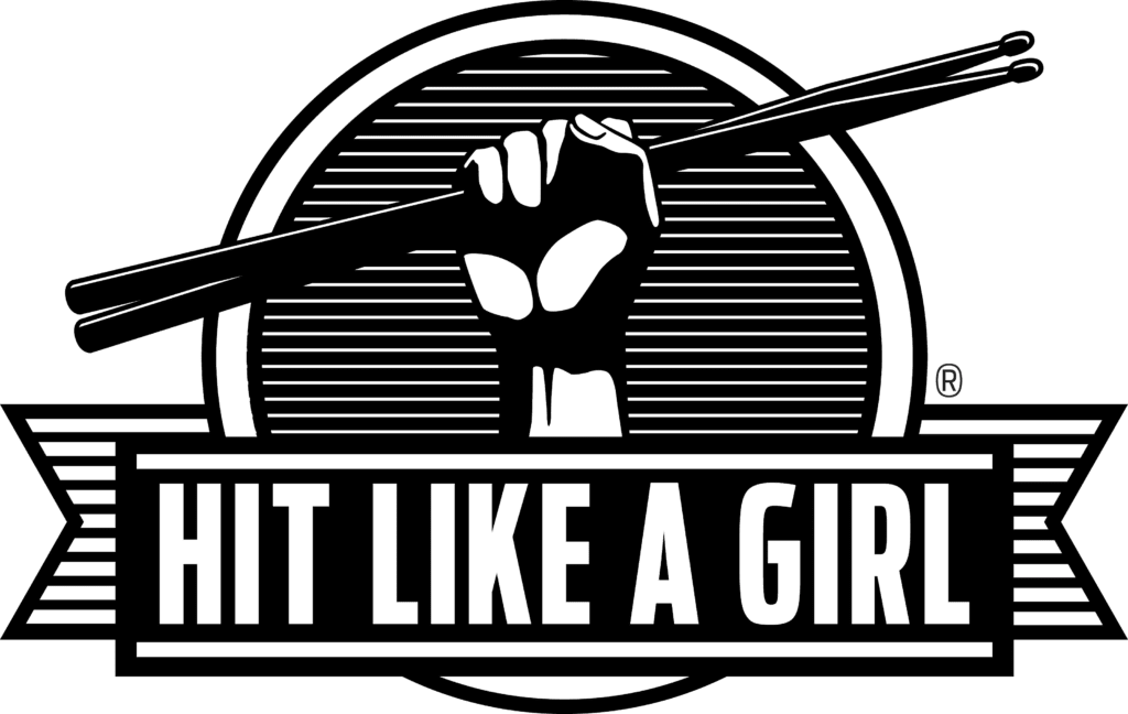 Hit Like A Girl logo with a banderole at the bottom and a hand with sticks