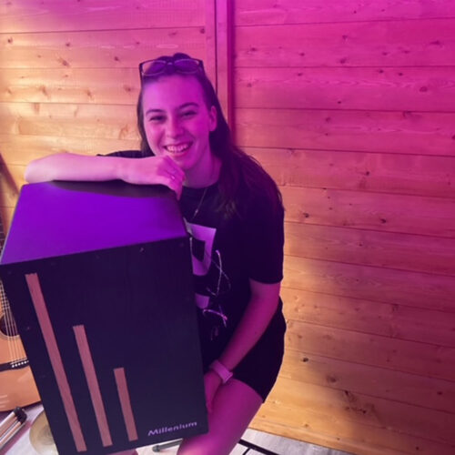 photo of Megan with her prize the BlackBox Cajón
